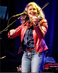 Anne Lindsay red jacket promo photo